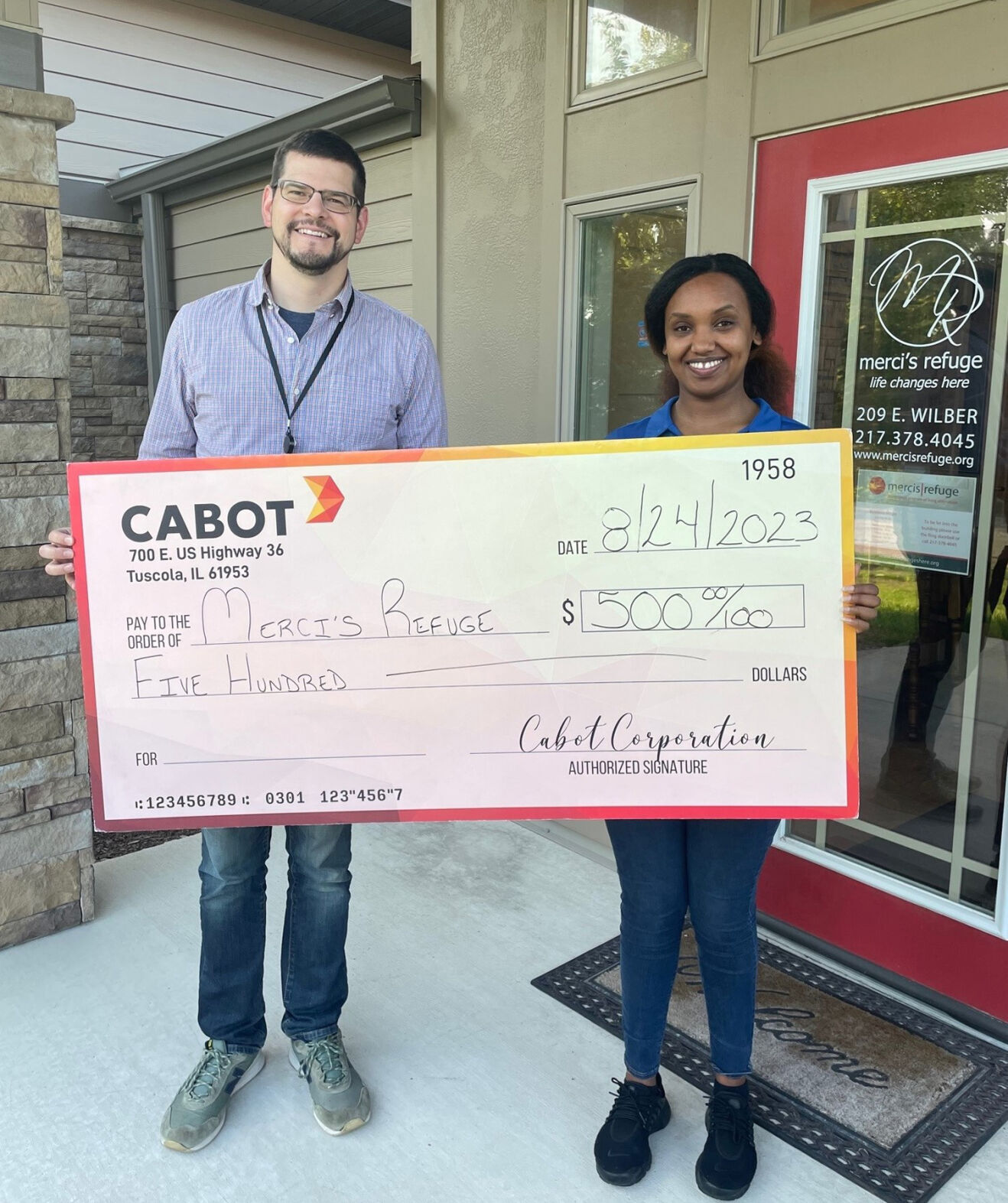 Cabot donation to Merci's Refuge.jpg